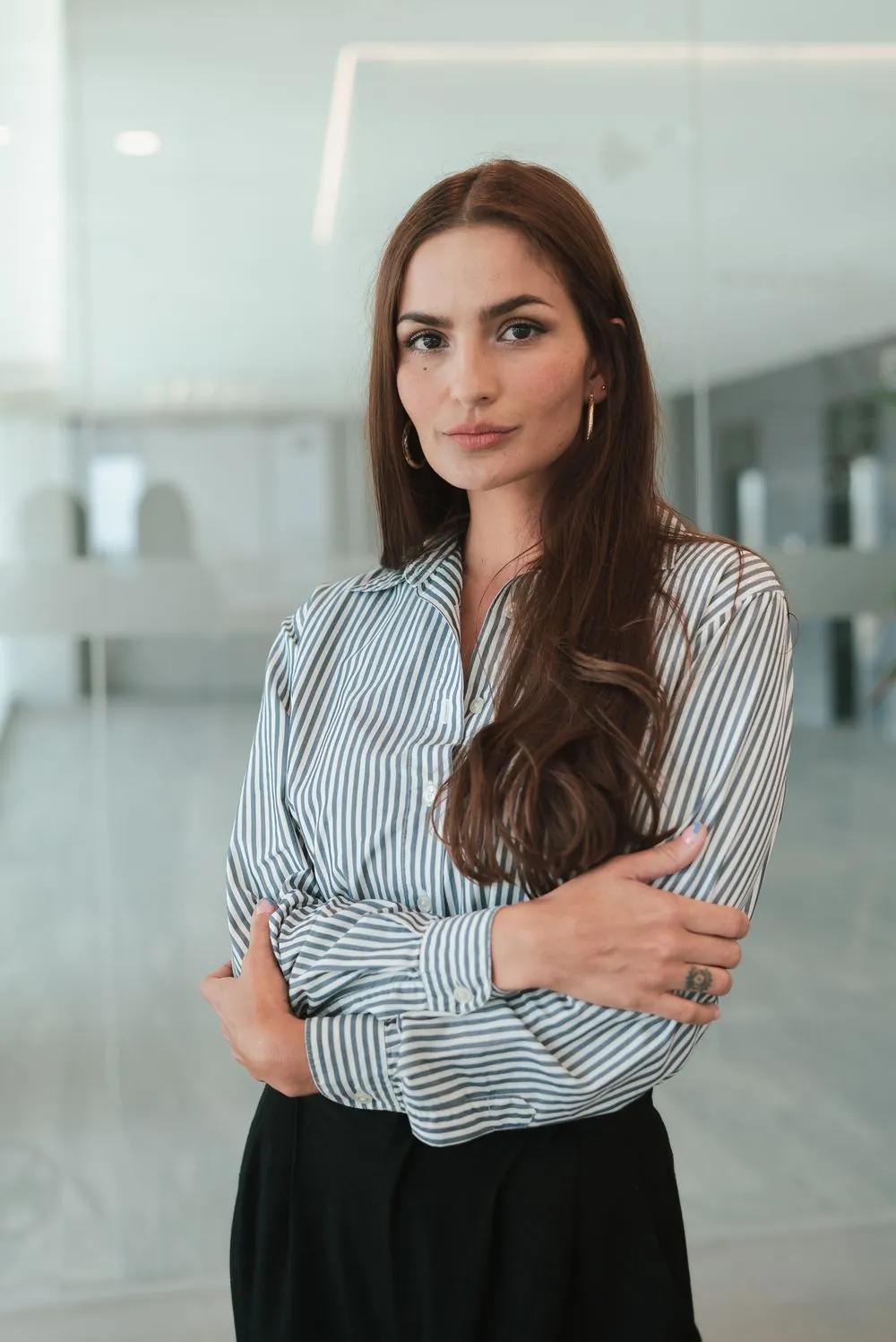A woman in a bright office